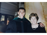 Gregory L. Beatty with his mother at his graduation